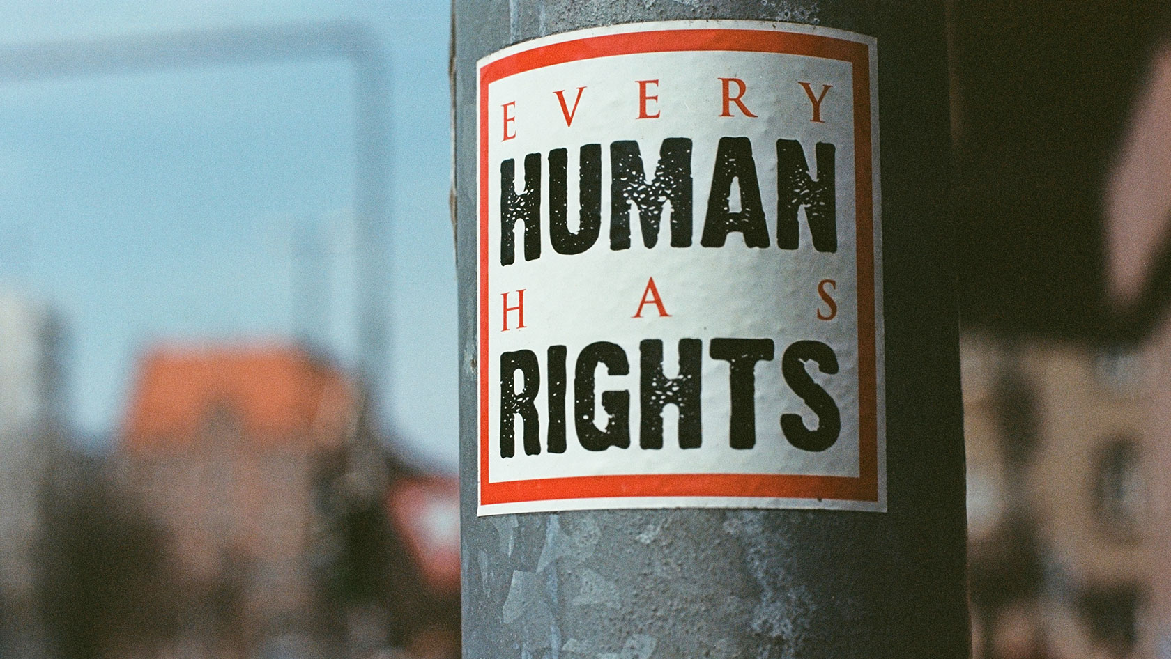 "Every Human Has Rights" (Sticker on a lamp post)